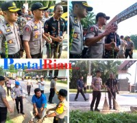 Kadis DLH Bersama Kapolres AKBP frido Ritonga mengadakan bersih sampah di bahu jalan