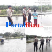 Kanit Binmas Polsek Pangkalan Kerinci Iptu Burhan Pantau Antisipasi Banjir Dan Pelarangan Pungli