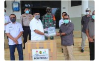 Peduli Penanganan COVID-19 di Siak, BOB dan PT Anugerah Tani Makmur Bantu Masker dan APD