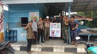 Babinsa Koramil 09 Langgam Kodim 0313/Kpr Sosialisasi Pasang Himbauan Jauhi Narkoba