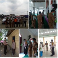 Bhabinkamtibmas Polsek Pangkalan Kerinci Giat Penyemprotan Dan Himbauan Antisipasi Virus Corona 