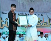 Semarak Tahun Baru Islam 1439 H,  Pemkab Inhil Torehkan Rekor MURI Sajian Tabak Bunga Telur Terbanya