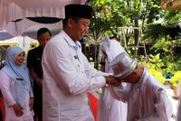 Firdaus Resmikan Khatam Alquran dan Makan Bajambau di SMPN 20 Pekanbaru