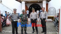 Polsek Pkl.Kerinci Bersinergitas dengan TNI Amankan Misa Natal