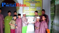 Peduli Anak Yatim Piatu, Polres Pelalawan Berikan Bantuan