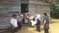 Kapolres Kampar Tinjau Daerah Rawan Banjir Dan Ingatkan Warga Untuk Waspada