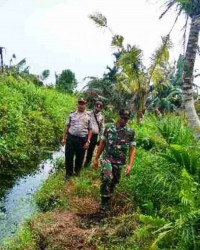 BABINSA SUNGAI BERAPIT KORAMIL 04/KUINDRA  MELAKSANAKAN KEGIATAN SOSIALISASI DAN PATROLI KARLAHUT 