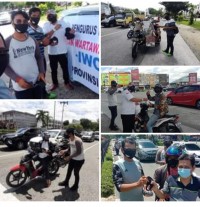 Cegah Covid-19, Ikatan Wartawan Online IWO Provinsi Riau Bagi 500 Masker Kepada Pengguna Jalan