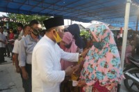 Penyaluran BLT-DD Tahap Lima Desa Sei Merdeka Di Hadiri Bupati