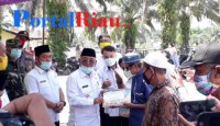 Penyerahan BLT-DD Tahun 2020 Desa Penarikan, Desa Padang Luas, Desa Langkan Kec.Langgam