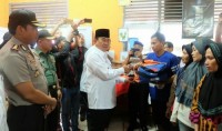 Bupati Wardan Kunjungi dan Serahkan Bantuan Buat Korban Kebakaran di Tembilahan Hulu, Inhil I