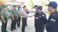 Polres Kampar Pimpin Upacara HUT Satpam ke-36 Di Lapangan Mapolres Kampar