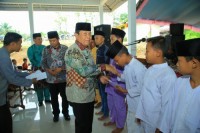 Bupati Resmikan Penggunaan Jalan Aspal dan Gedung Serba Guna Desa Pasir Agung