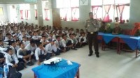 Kapolsek Tapung Hulu Sosialisasikan Dampak Penyalahgunaan Narkoba ke Sekolah