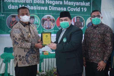 PJ. Bupati Labuhanbatu Isi Materi Seminar dan Focus Group Discussion